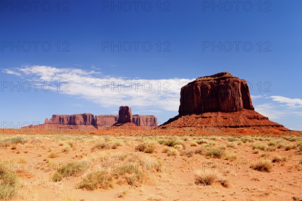 Very hot day in Monument Valley - Iconic peaks of rock formations in the Navajo Park, Utah