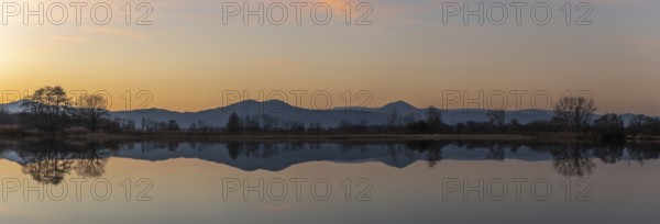 Autumn landscape of trees reflecting in the water at sunset. Autumn landscape. Bas-Rhin, Alsace, Grand Est, France, Europe