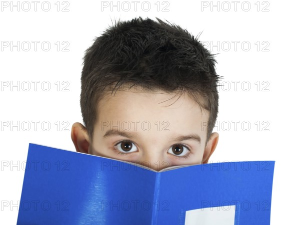Child with notebook in front of the face. White isolated
