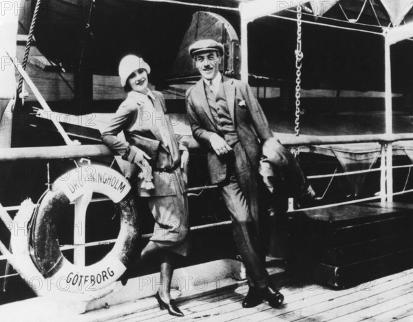 Swedish actress Greta Garbo. 1905-1990. Swedish actress with her glory days during the 1920s and 1930s. She retired from the screen at the age of 35 after acting in 28 films. Pictured 20 years old upon her arrival to Hollywood from Sweden 1925. Beside her the swedish film director Mauritz Stiller, both on the passenger ship Drottningholm