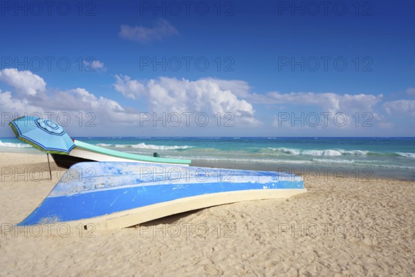 Tulum Caribbean turquoise beach boat in Riviera Maya of Mayan Mexico