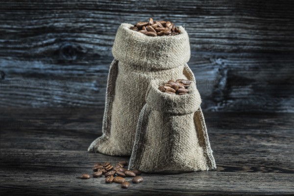 Little and big sacks of coffee beans
