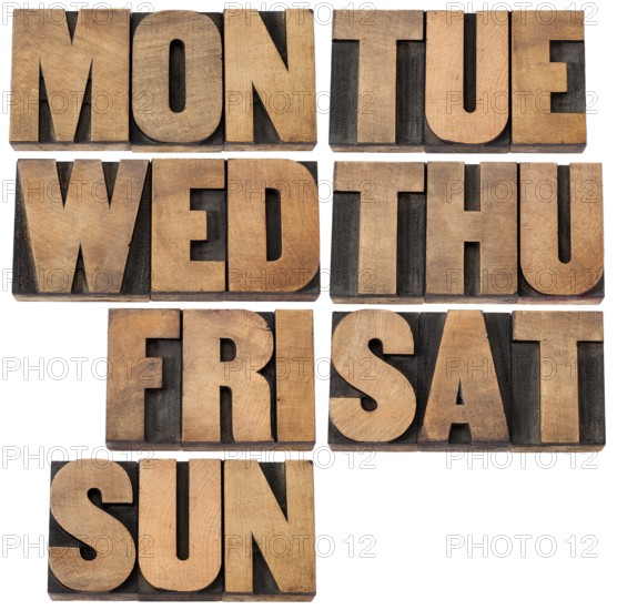 7 days of week (first 3 letter symbols) in isolated vintagewood letterpress printing blocks