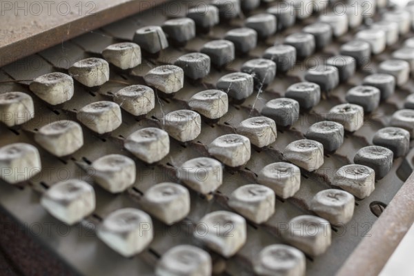 Details of an old keyboard on industrial machine of the late nineteenth century