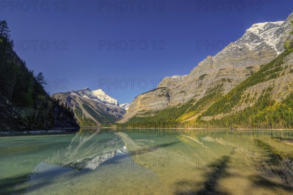 Beautiful autumn landscape scene in mountain in background in Jasper National Park west Canada with birds