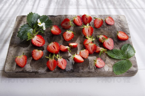 Small pieces of strawberries for the preparation of salad