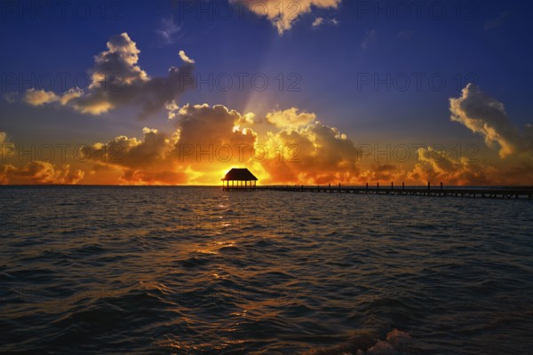 Holbox island sunset beach tropical hut pier in Mexico