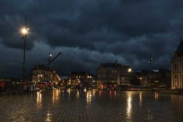 Laeken, Brussels Capital Region, Belgium- 11 09 2021: Night scape of the old town square with city lights and traffic in the background