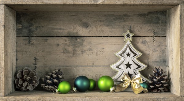 Some green glass balls and fir tree Christmas symbols decoration