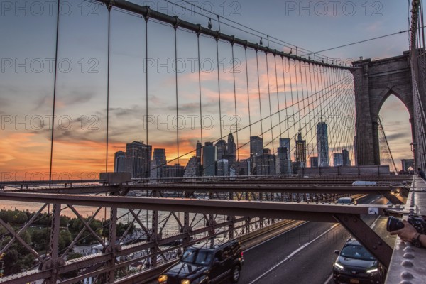 Night coming over famous Brooklyn Bridge, New York City, USA, North America