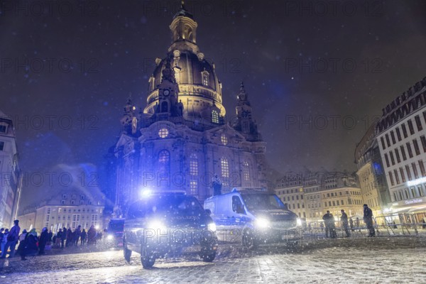 On 13 and 14 February 1945, Dresden was heavily destroyed in three Allied bombing raids. Every year, the people of Dresden commemorate this event at various events. A long human chain symbolises the protection of the city centre. Strong police forces in action on neumarkt square, Dresden, Saxony, Germany, Europe