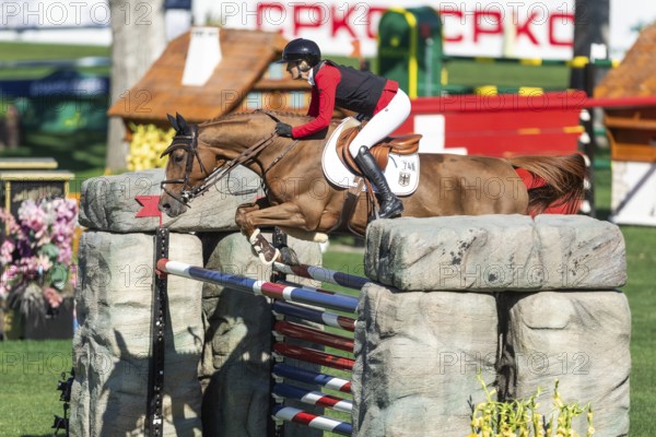 Calgary, Canada, Sept., 7, 2024. Jana Wargers of Germany, riding Dorette Old compete in the BMO Nations Cup during the CSIO Spruce Meadows, Masters, presented by Rolex, North America