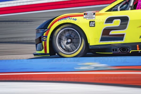 NASCAR Cup Series driver, AUSTIN CINDRIC (2), races through the turns during a practice session for the Bank of America ROVAL 400 at Charlotte Motor Speedway Road Course in Concord, NC, Concord, United States of America
