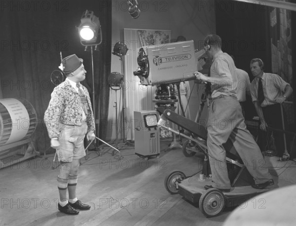 Television in the 1940s. Actor Max Hansen performing on televison 1948. A television broadcast prior national television and for viewing on only 15 tv recievers on the nearby department store NK. The British media company Pye Ltd, had already sucess with the new tv medum and was early one of BBC s suppliers of tv technology. Photo Kristoffersson ref 229a-6