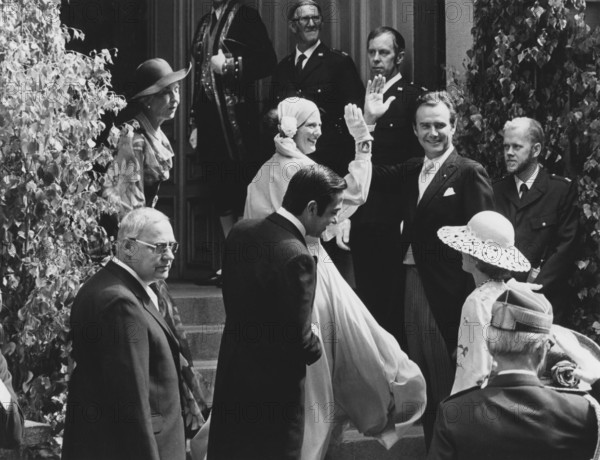 Queen Margrethe of Denmark. Here with her husband Prince Henrik of Denmark in connection with their exit from the Storkyrkan in Stockholm as wedding guests at the royal wedding between Carl XVI gustaf and Silvia Somerlath on June 19, 1976