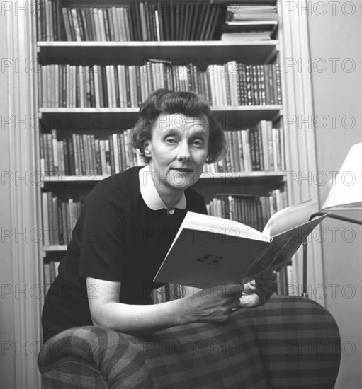 Astrid Lindgren. Swedish author of childrens books, songs and novels. Born 14 november 1907 - 28 january 2002. Internationally famous for the books featurings Pippi Longstocking, Emil of Lönneberga, Karlsson-on-the-roof and the Six Bullerby children. 2017 she was calculated to be the world's 18th most translated author. Roughly 167 million of her books was sold worldwide 2010. Pictured at home in her apartment on Dalagatan 46, 1961. Roland Palm ref 11-04-9