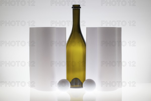 Symmetry abstract Paper Background with glass and golf balls on a glass table