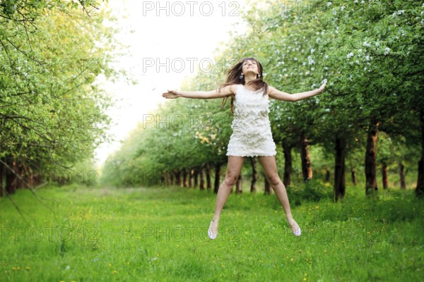 Girl are jumping in the park