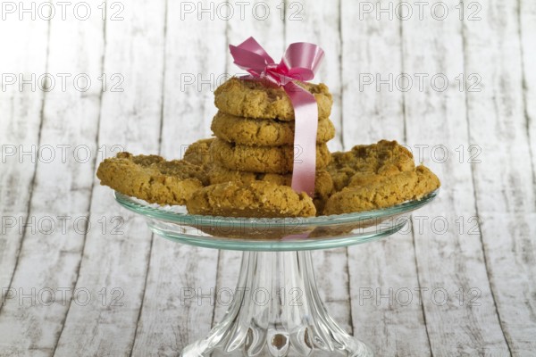 Delicious biscuits on a decorative background