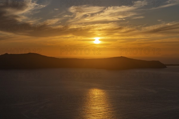 Sunset at sunset, Thirassia Island, Archipelago of Santorini, Cyclades, Greece, Europe