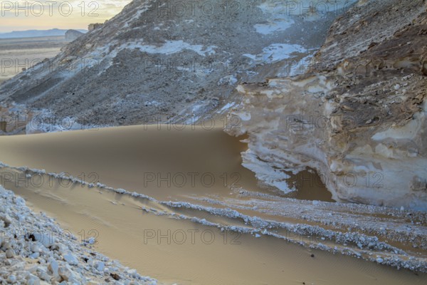 Late afternoon sun casting shadows on rocks in the Libyan desert white desert, Farafra, Egypt, Africa