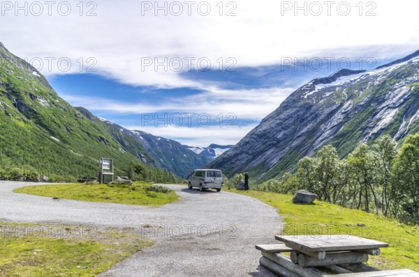 An idyllic valley in Strynefjell in Middle Norway in summertime with mountains and stream.A beautiful valley in the Middle of Norway in summertime