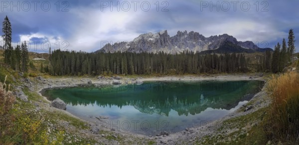 Karersee is located in the Latemarwald forest in the upper part of the Eggental valley, of the city of Bolzano at an altitude of 1520 meters above sea level of Nova Levante