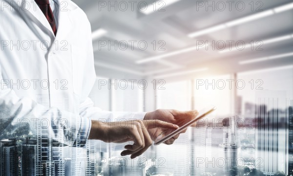 Double exposure of confident doctor in white sterile coat standing inside hospital office and modern cityscape view on background. Concept of modern medical industry