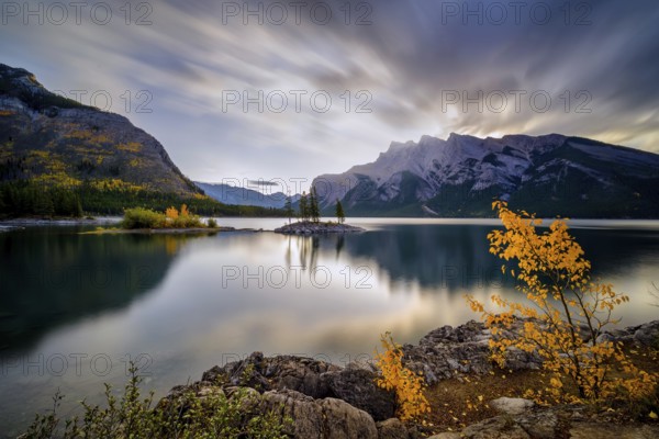 Beautiful autumn landscape scene in lake and mountain in background in west Canada