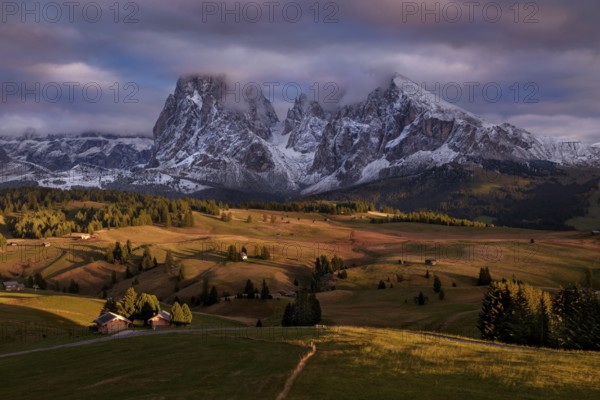 Snowy Alpe di Siusi, Seiser Alm, Sassolungo a Sassoplatto at sunset