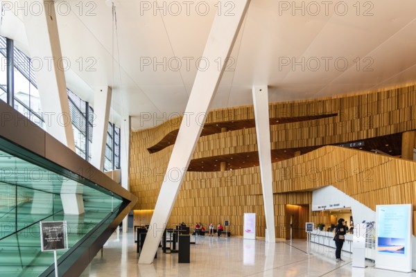 Oslo, Norway, August 11, 2019: Opera house in Oslo. Interior view. Modern building designed by Snohetta architects. It is the National Theater of Opera and Ballet of Norway. Entrance and foyer, Europe