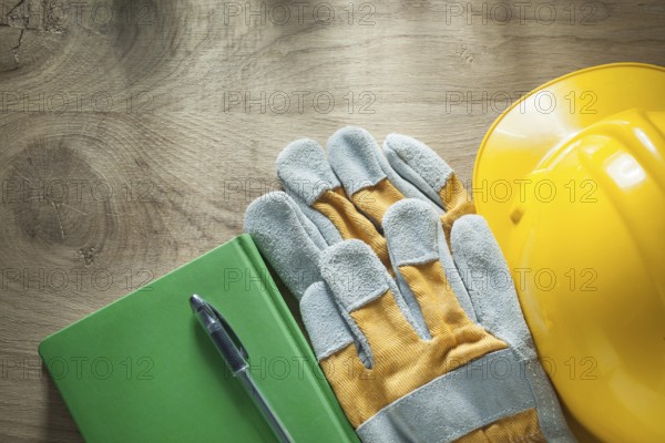 Note-book pen protective gloves building helmet