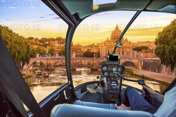 Rome at Sunset with San Pietro basilica, Sant'Angelo bridge and Tevere river in Roma, Italy. Helicopter cockpit with pilot arm and control console inside the cabin