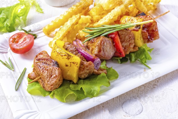 Shish kebab skewers with marinated ham meat paprika and red onion