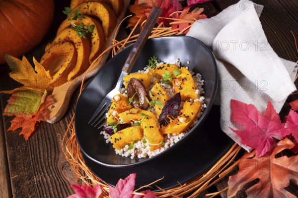 Gratinated vegetarian pumpkin with barley, oats, plums and thyme