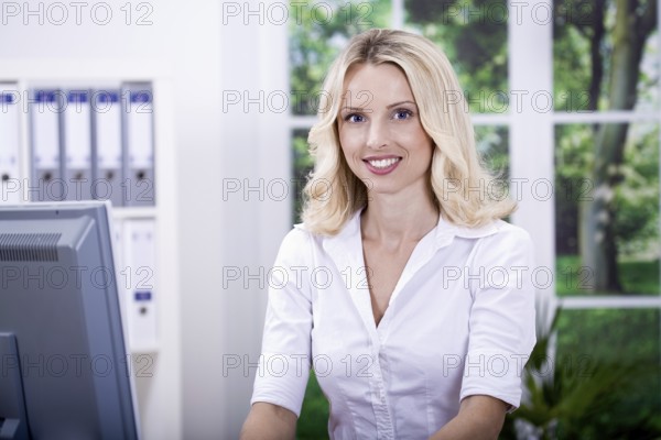A young woman in the office