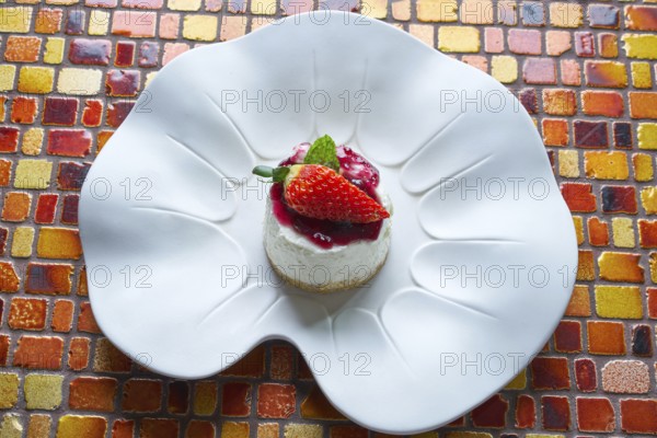 Cheesecake with cranberries sauce dessert