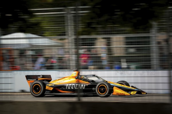 PATO OWARD (5) of Monterey, Mexico runs through the streets during the Honda Indy Toronto in Toronto, ON, CAN