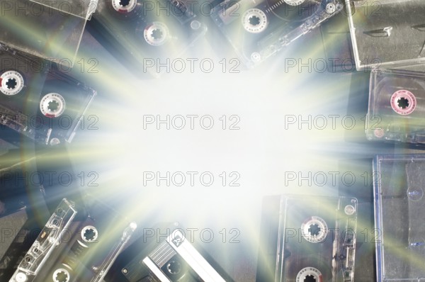 Old fashioned audio tape cassettes background. Text space in center