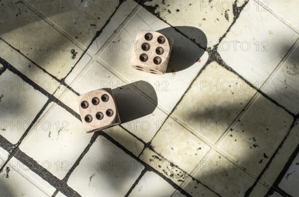 Two wooden dices on table