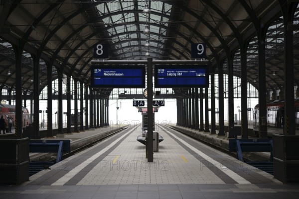 Wiesbaden, Germany - October 15, 2017: The interior of Wiesbaden Central Station with platforms and fog in the background on 15 October 2017 in Frankfurt