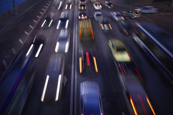 Car traffic at night. Motion blurred background. Long exposure shot