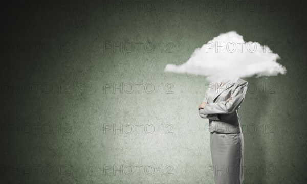Businesswoman with arms crossed on chest and head in cloud