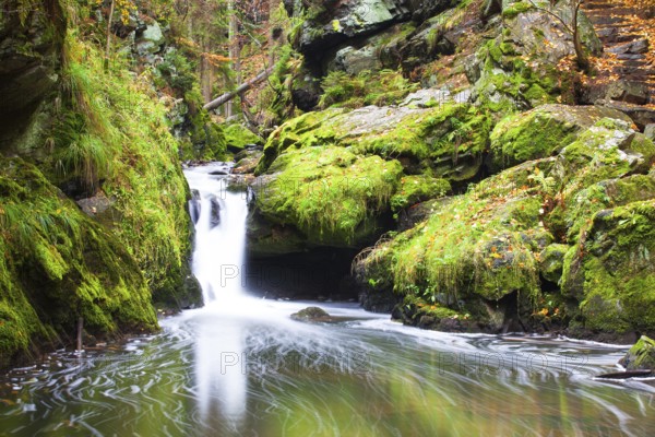 Waterfall in Doubravka valley in autumn - Highlands in Czech Republic