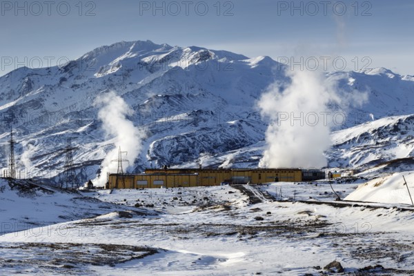MUTNOVSKY VOLCANO, KAMCHATKA PENINSULA, RUSSIAN FAR EAST, Oct 22, 2017: Winter view on Mutnovskaya Geothermal Power Plant (Mutnovskaya GeoPP-1) Geotherm JSC (RusHydro) at foot of active volcano