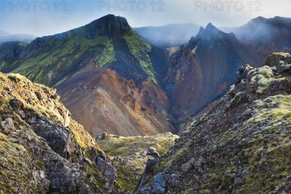 The picturesque valley surrounded by rhyolite mountains. Summer morning in the National Park Landmannalaugar, Iceland, Europe