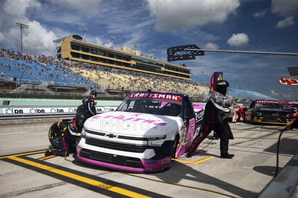 The crew of Niece Motorsports performs a pit stop during the 28th Annual Baptist Health 200 at Homestead-Miami Speedway in Homestead FL, Homestead, United States of America