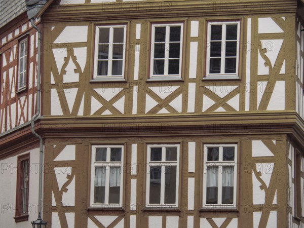 Half-timbered building with characteristic timber structure and harmonious cityscape, mainz, rhineland-palatinate, germany