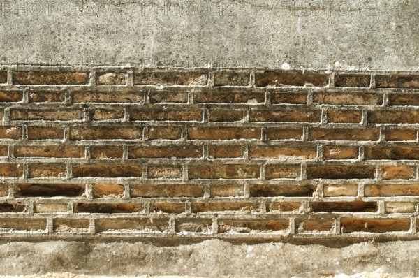Ancient Brick Wall. River dike