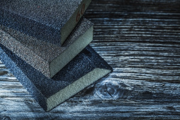 Sanding blocks on vintage wooden board top view